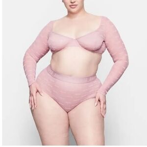 Skims after hours logo top